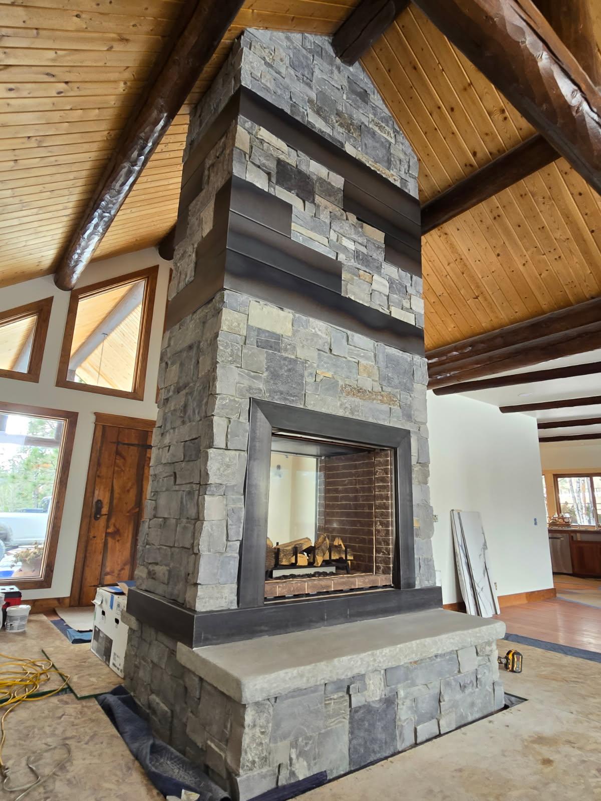Custom stone fireplace built by S. Williams Construction